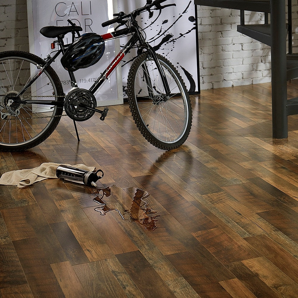 QuickStep Studio + Spill Repel Restoration Oak 12-mm T x 7-in W x 48-in L Waterproof Wood Plank Laminate Flooring (19.63-sq ft / Carton)