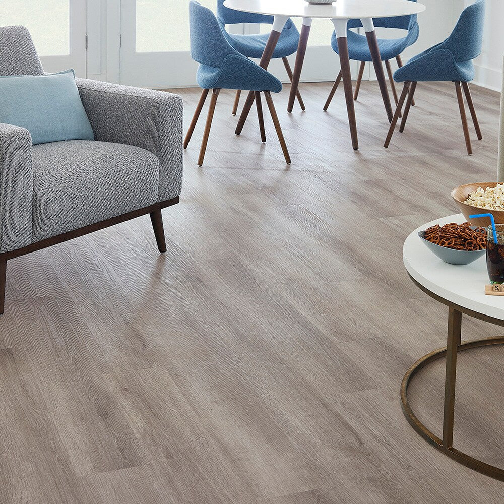 STAINMASTER Barnes Oak Gray 12-mil x 7-3/32-in W x 47-in L Waterproof Interlocking Luxury Vinyl Plank Flooring (17.33-sq ft/ Carton)