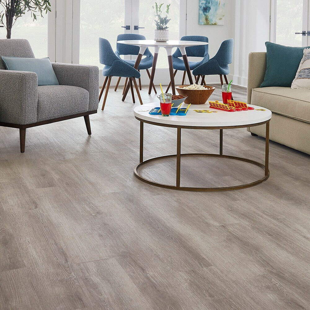 STAINMASTER Barnes Oak Gray 12-mil x 7-3/32-in W x 47-in L Waterproof Interlocking Luxury Vinyl Plank Flooring (17.33-sq ft/ Carton)