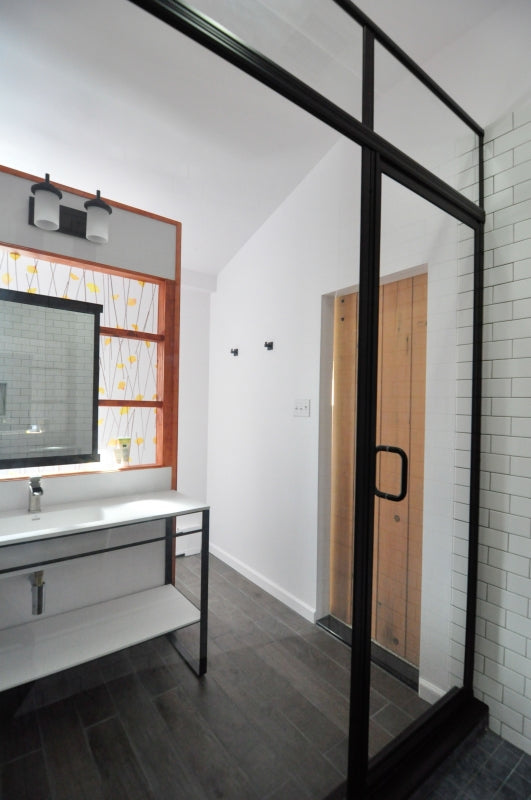 Modern Industrial Bathroom with Organic Elements