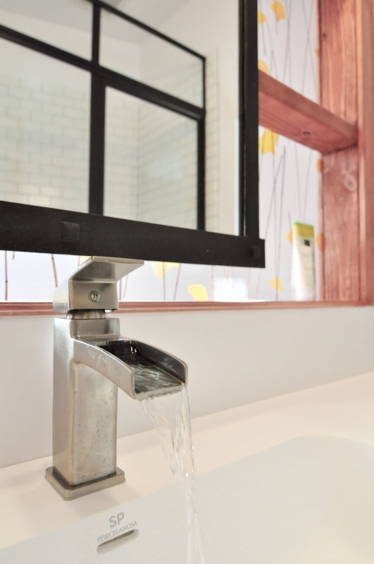 Modern Industrial Bathroom with Organic Elements