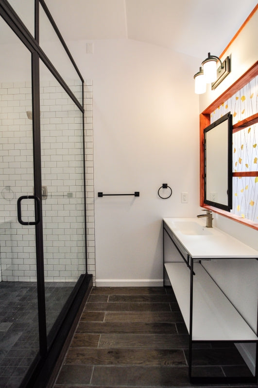 Modern Industrial Bathroom with Organic Elements
